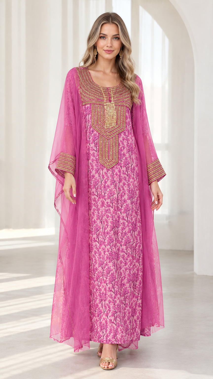Front full view of woman wearing fuchsia gold embroidered cape maxi kaftan dress