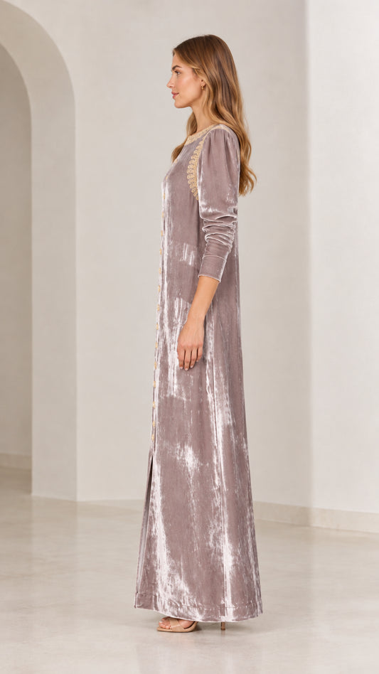 Side profile view of mauve crushed velvet maxi dress