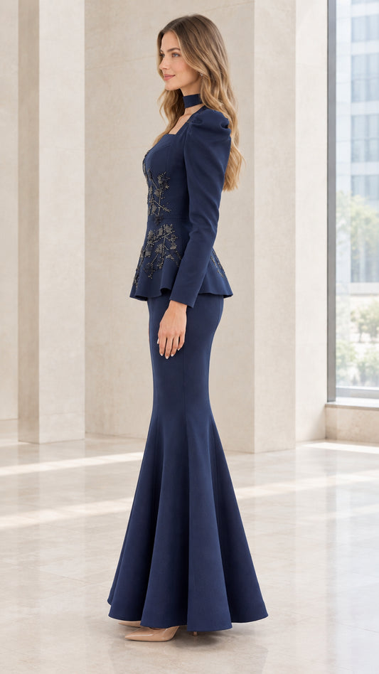 Side profile view of Navy Blue peplum maxi dress showing fitted mermaid silhouette