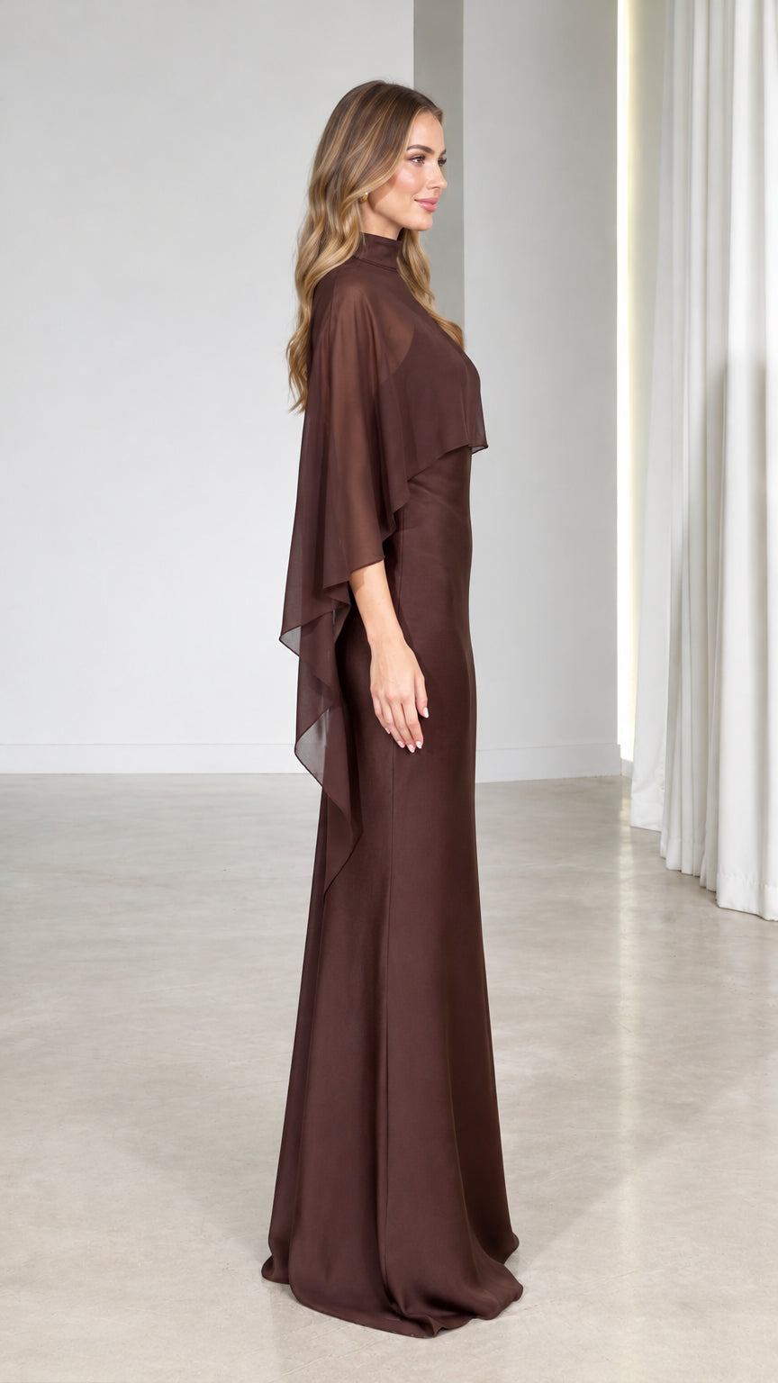 Side profile of model wearing Chocolate Brown floor-length capelet gown
