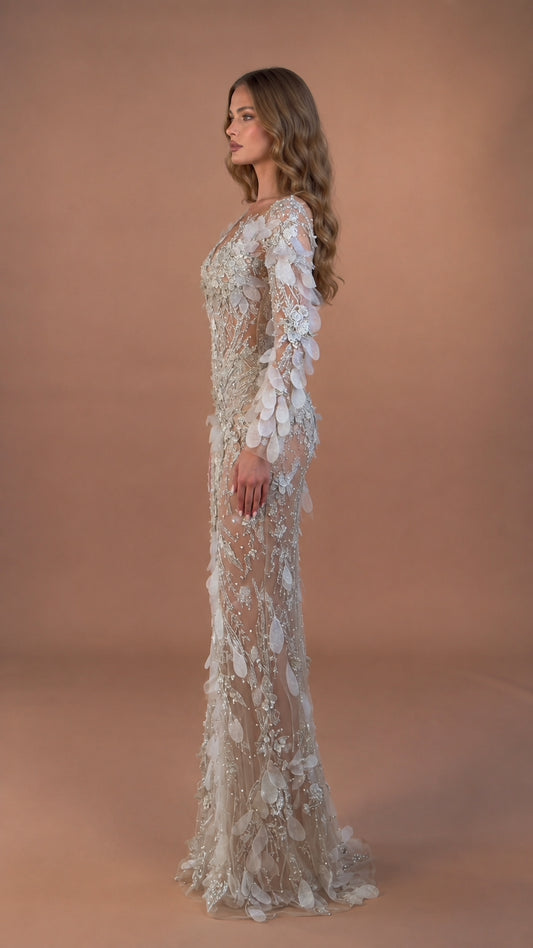 Side profile of model in Champagne Silver embellished long sleeve formal dress