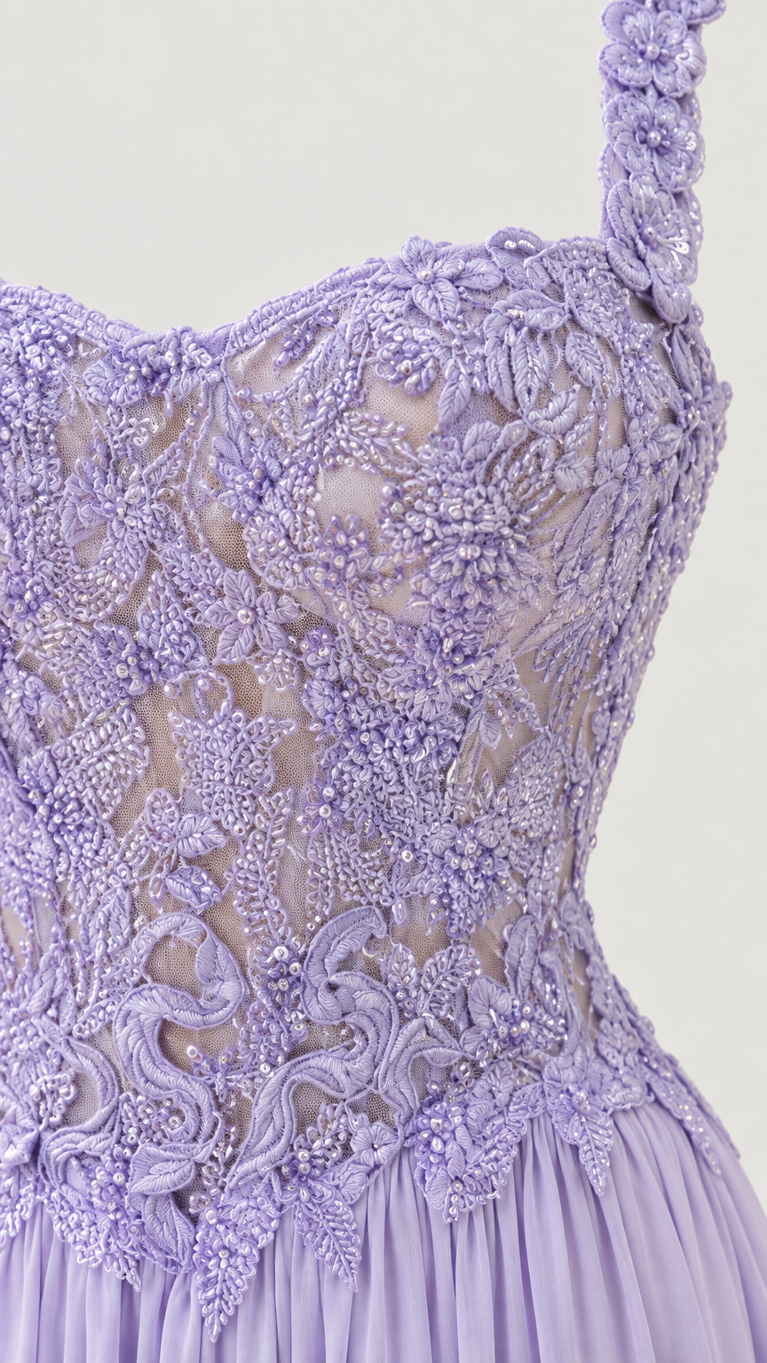 Close-up detail of textured floral lace and applique on corset bodice