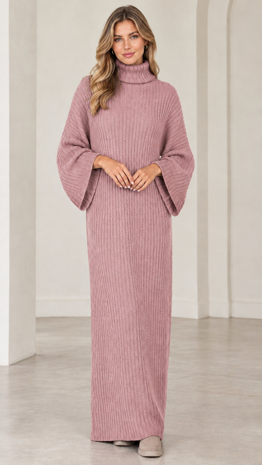 Full front view of model wearing dusty pink turtleneck ribbed maxi sweater dress