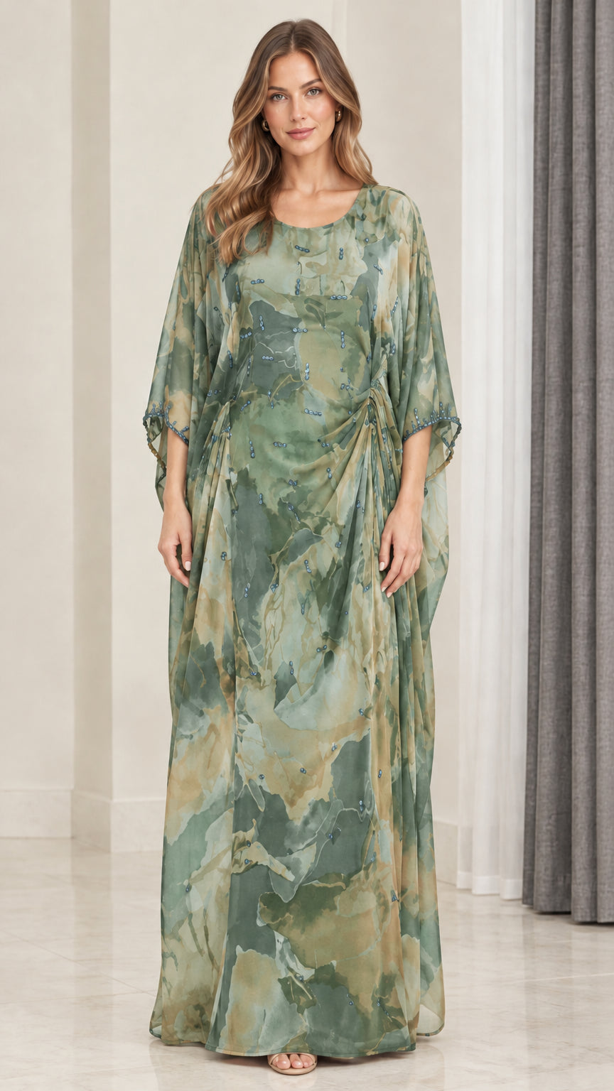 Front view of model wearing sage green watercolor draped kaftan maxi dress