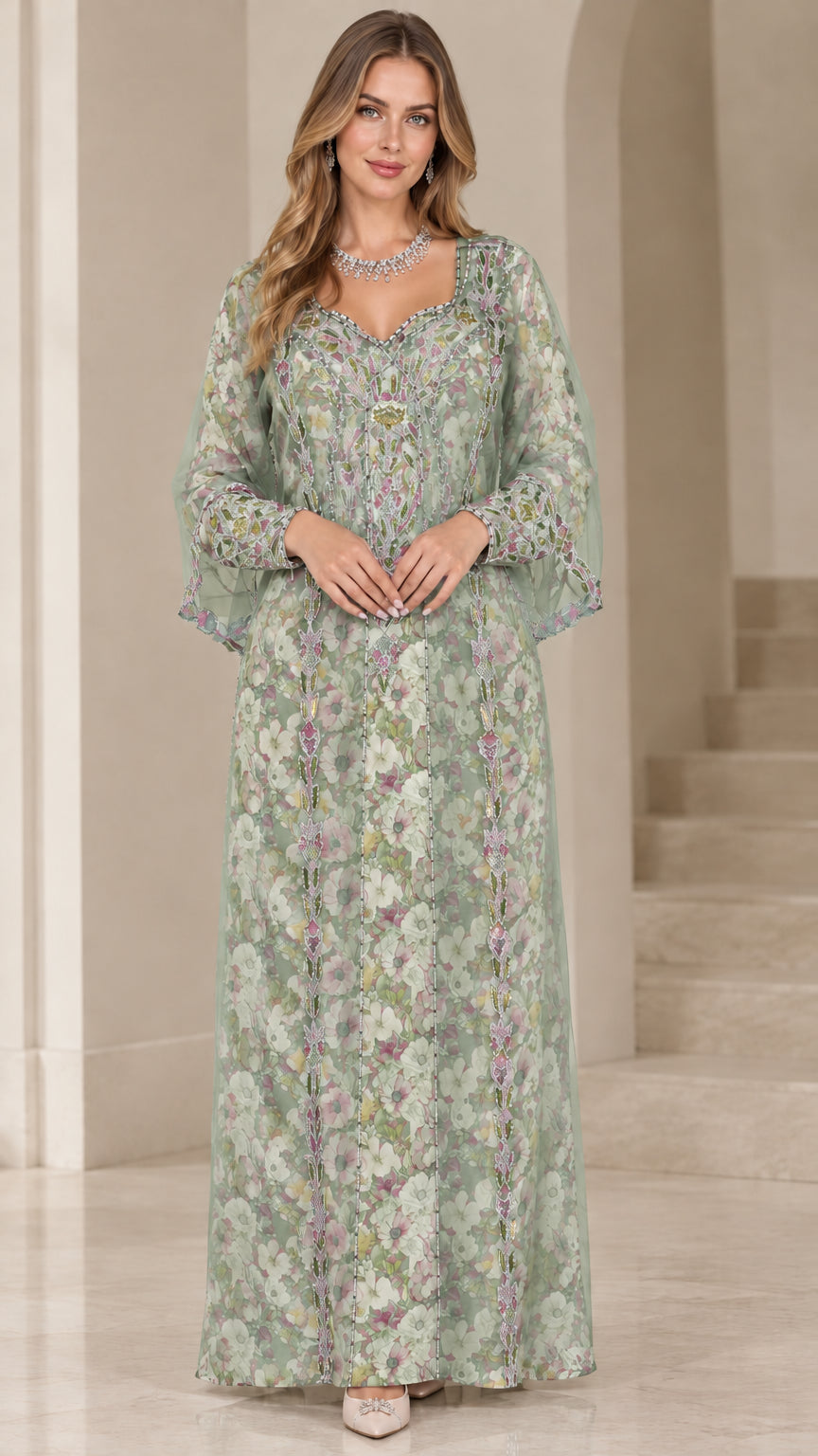 Front view of woman wearing sage green floral embroidered kaftan maxi dress