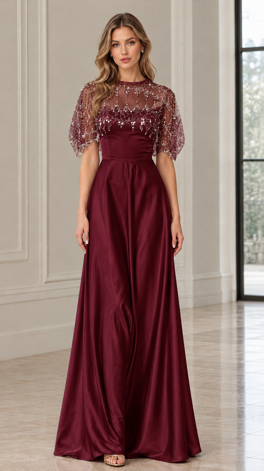 Front view of burgundy beaded illusion capelet satin evening gown