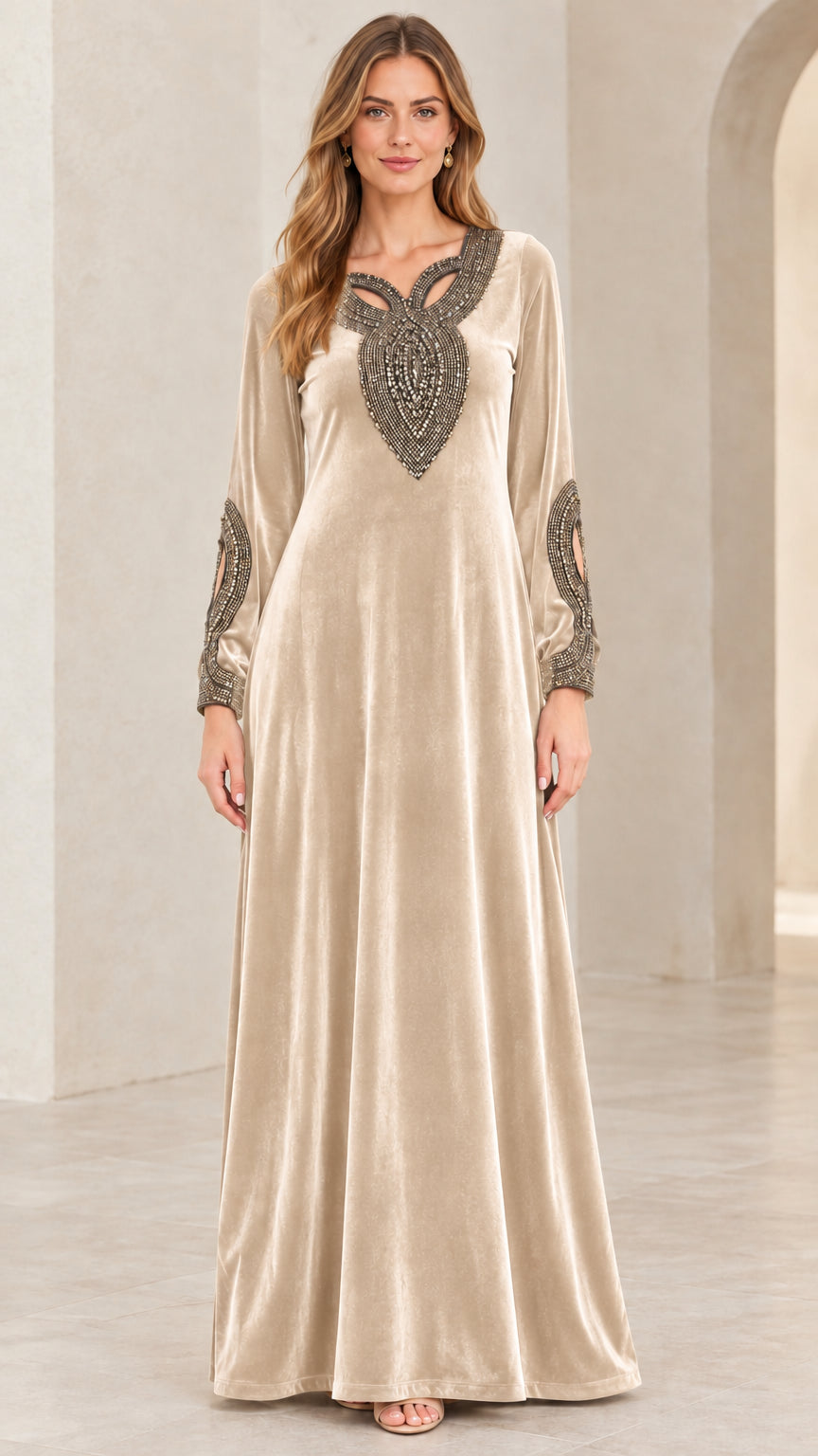 Model wearing Champagne gold velvet embellished long sleeve maxi dress