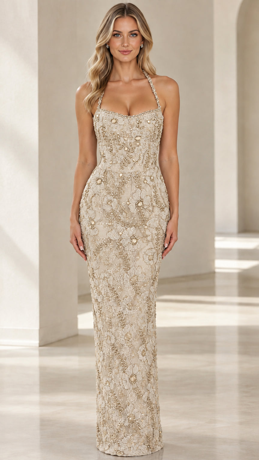Front view of woman wearing Champagne floral beaded halter evening gown