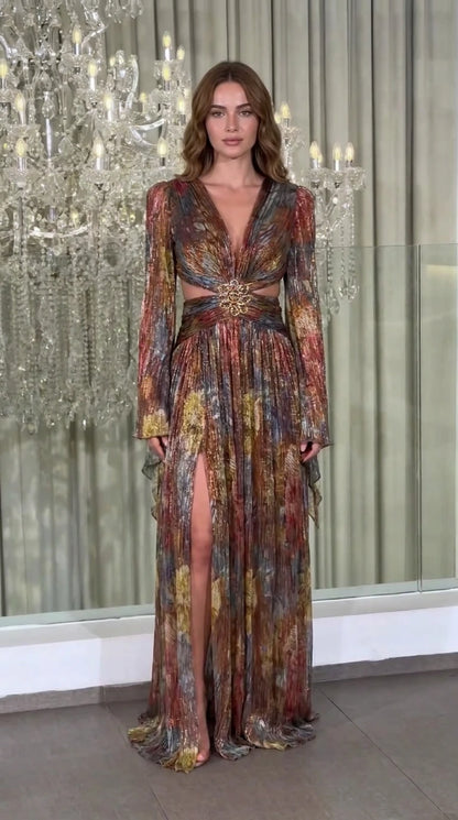 Full front view of model wearing Rust Multi metallic plissé long sleeve cutout maxi gown
