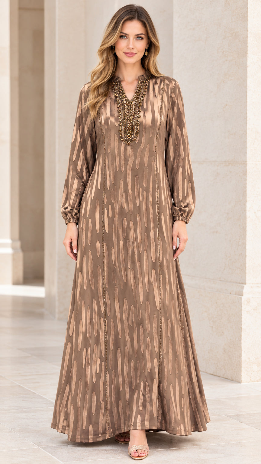 Front view of woman wearing Bronze beaded V-neck long sleeve maxi dress