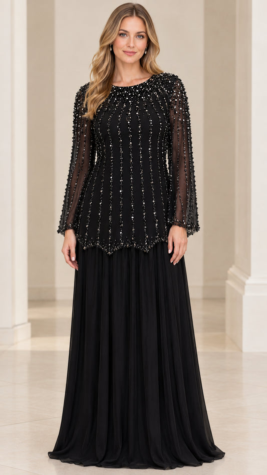 Front view of woman wearing Black beaded long sleeve evening gown with pleated chiffon skirt