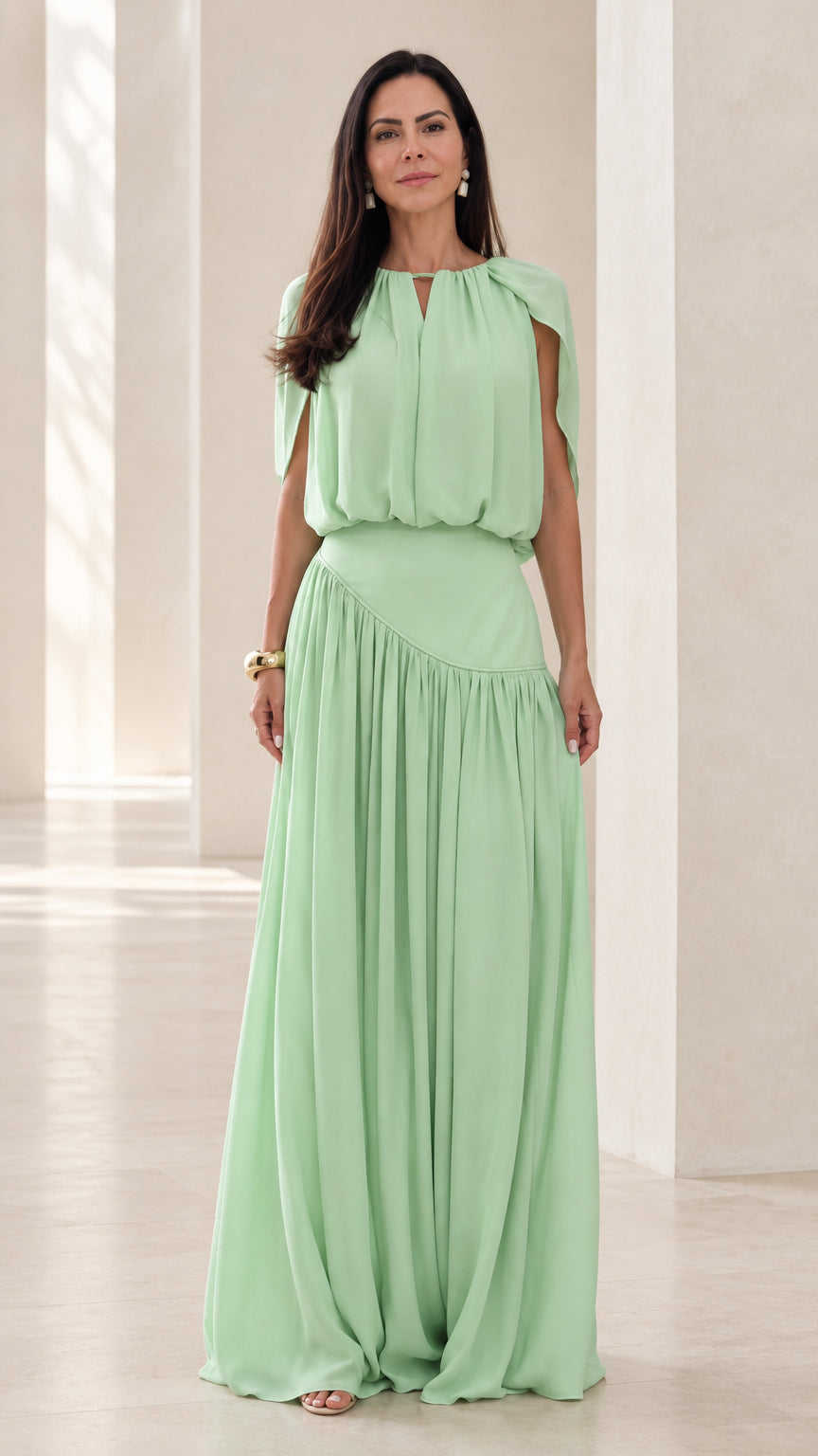 Front view of model wearing Mint Green cape sleeve asymmetrical gathered maxi dress