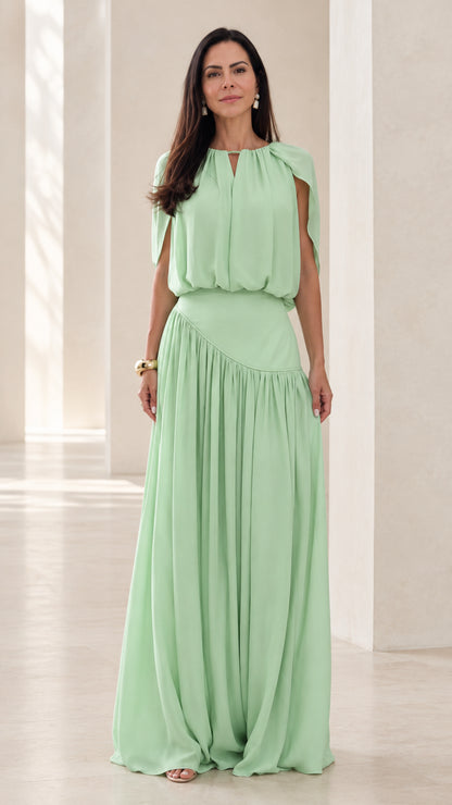Front view of model wearing Mint Green cape sleeve asymmetrical gathered maxi dress