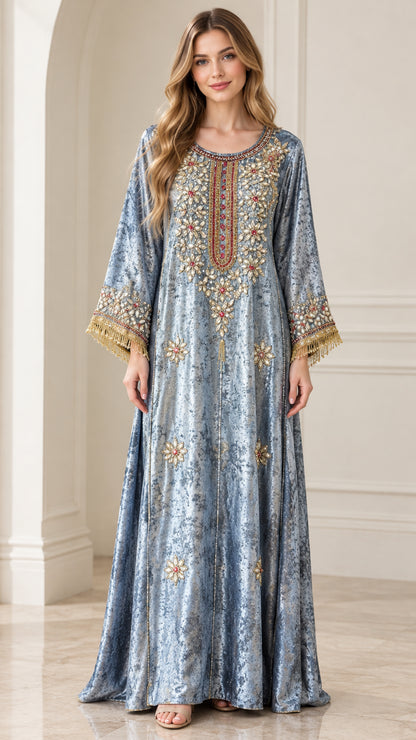 Front view of model wearing dusty blue crushed velvet embroidered kaftan maxi dress
