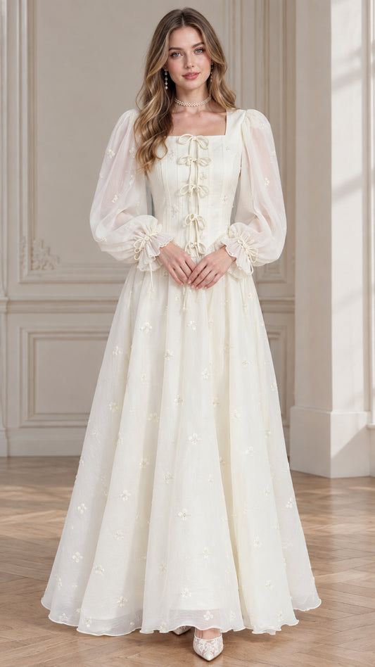 Front full view of ivory vintage corset maxi dress with sheer lantern sleeves