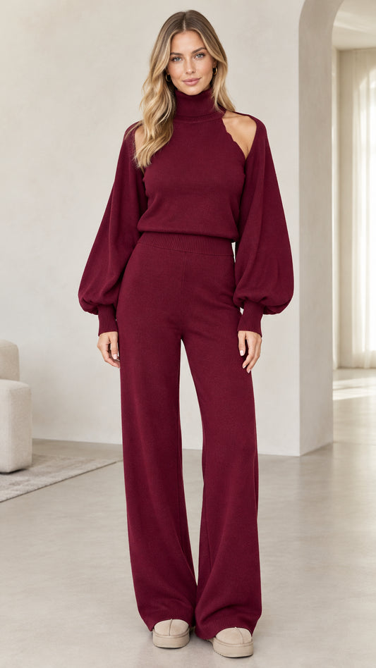 Woman wearing burgundy cutout turtleneck sweater and wide-leg knit pants set front view