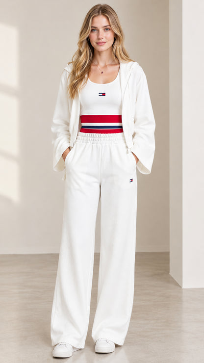 Full front view of women's 3-piece white lounge set with cropped zip hoodie, tank top, and wide leg pants