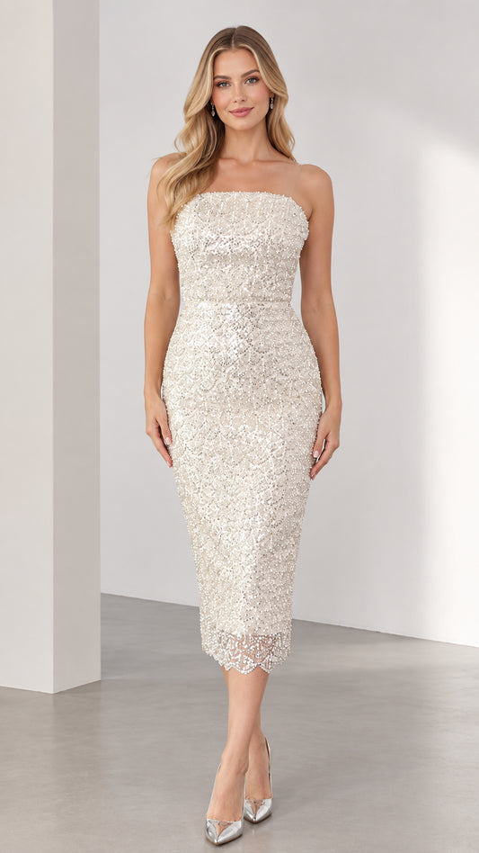 Front full view of woman wearing ivory strapless sequin bodycon midi dress