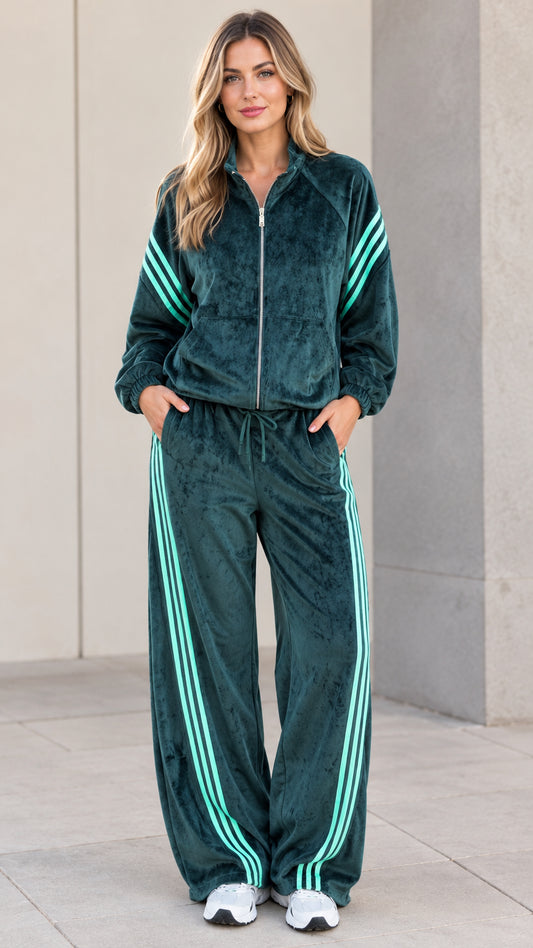 Full front view of women's dark green velour tracksuit set with mint side stripes