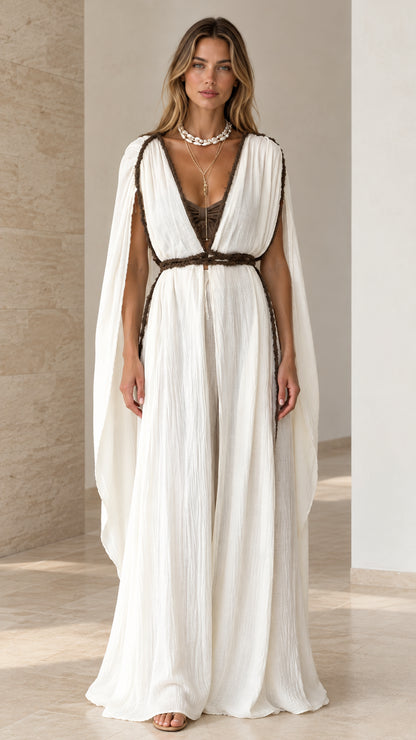 Front full view of white Grecian draped cape sleeve maxi dress with braided belt