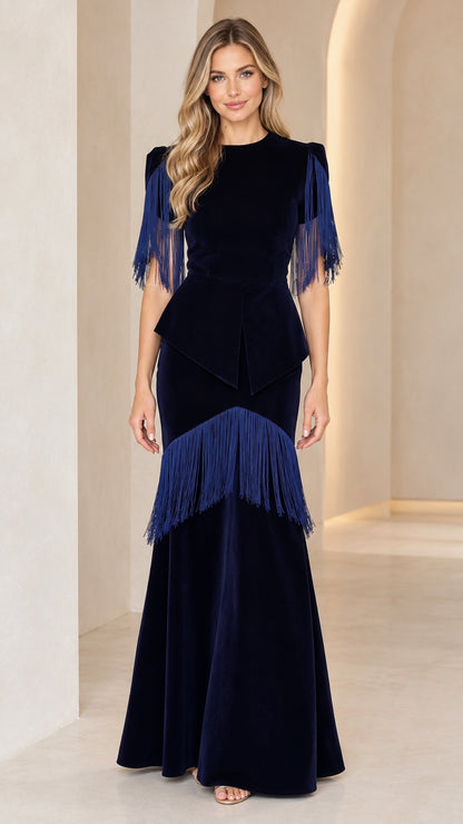 Full front view of navy blue velvet fringe peplum evening maxi dress