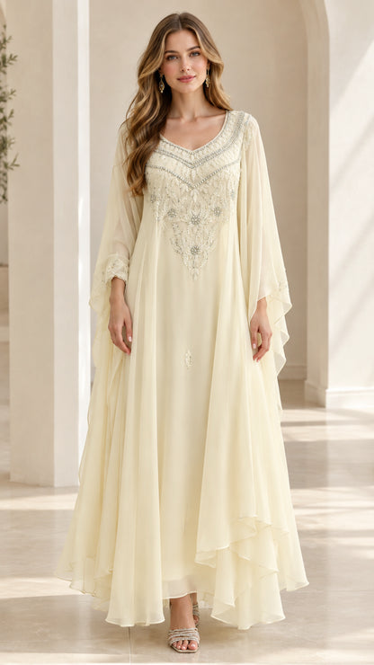 Full front view of ivory embroidered chiffon maxi gown with flowy cape sleeves