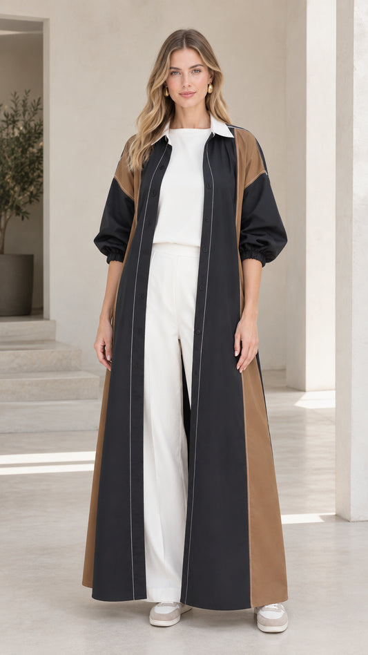Model wearing Black colorblock maxi shirt dress duster layered over white outfit