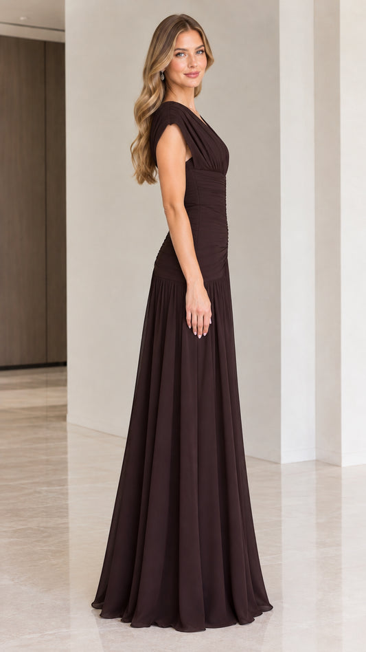 Side full-length view of model wearing Chocolate Brown ruched formal gown