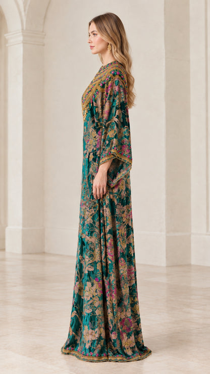 Side profile view of the Emerald Green floral kaftan dress showing draped sleeve and floor-length silhouette