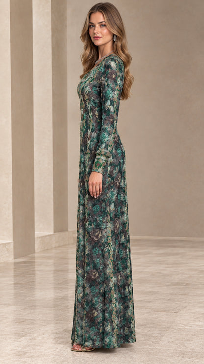 Side profile view of emerald green floral long sleeve evening gown