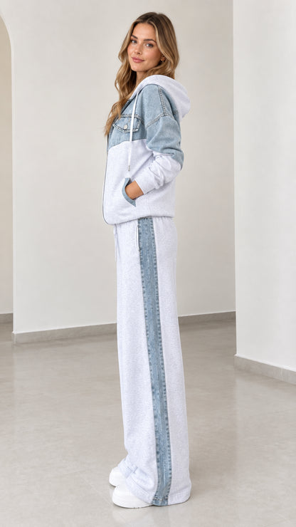 Side angle view of model wearing light grey and denim side-stripe wide-leg lounge set