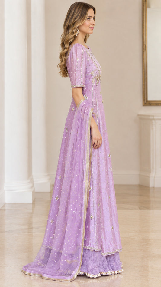 Side profile of lavender floor-length occasion dress showing flow and silhouette
