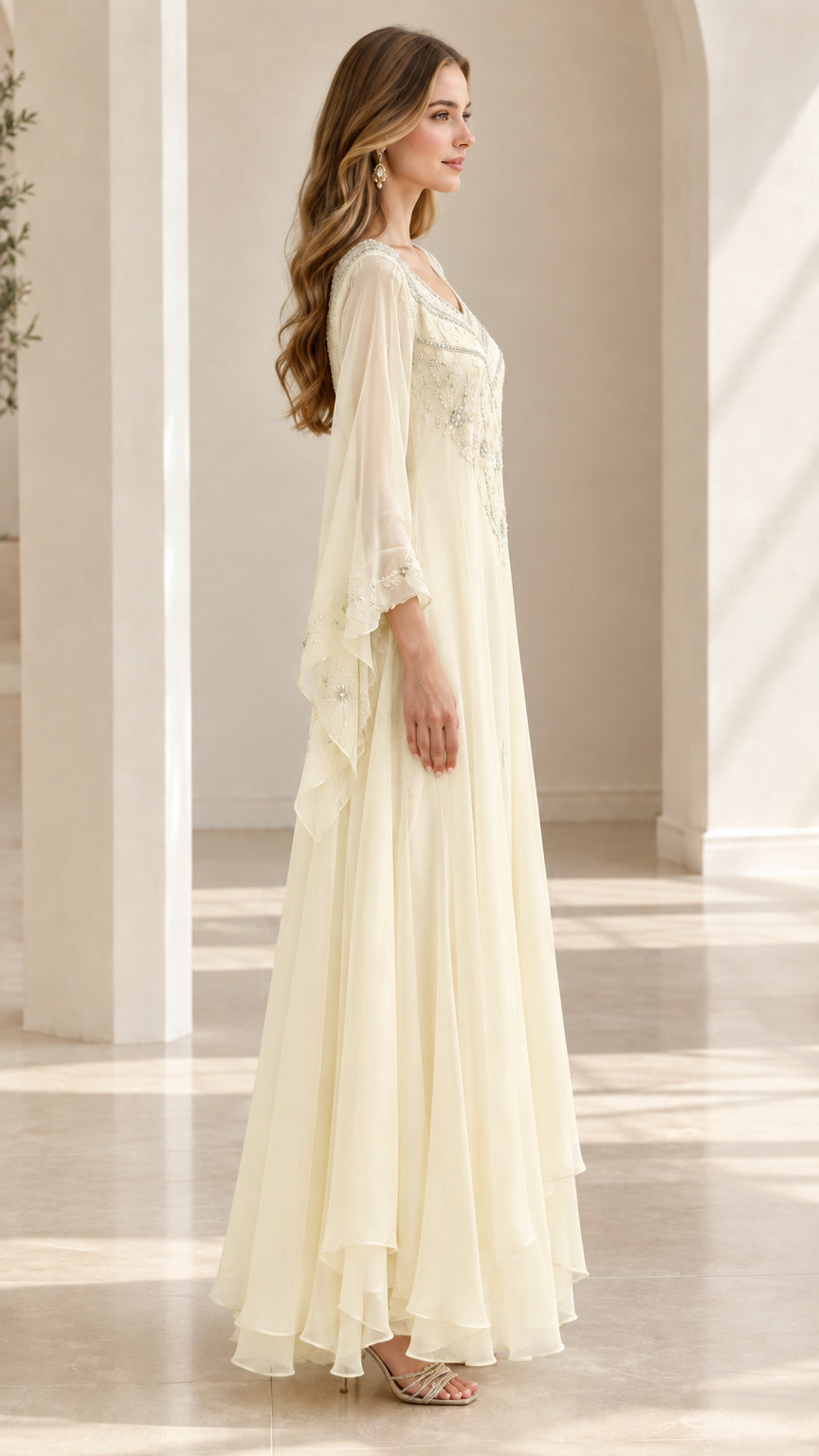 Side profile of ivory flowy chiffon formal evening dress