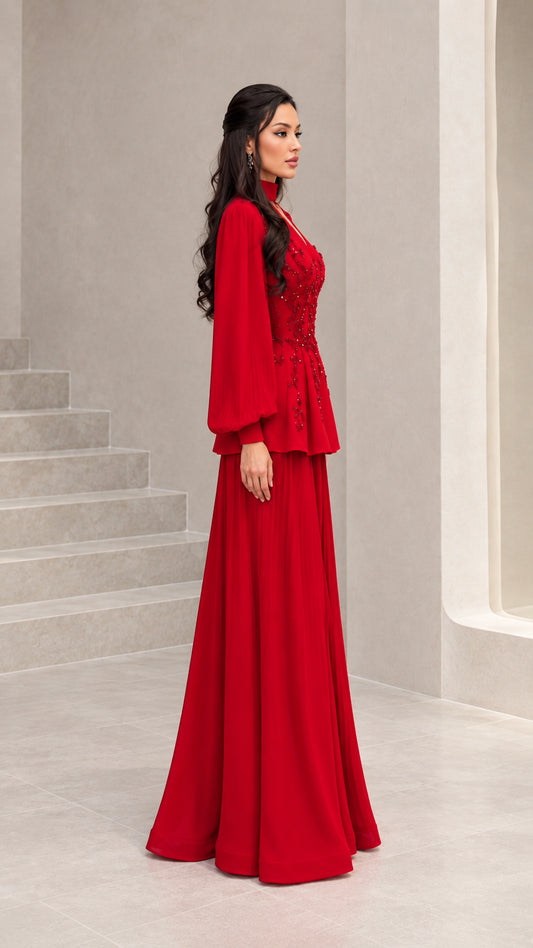 Side profile of woman in red peplum formal maxi dress