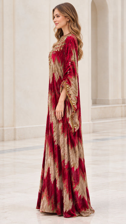 Side profile of model wearing Burgundy flowing velvet kaftan dress