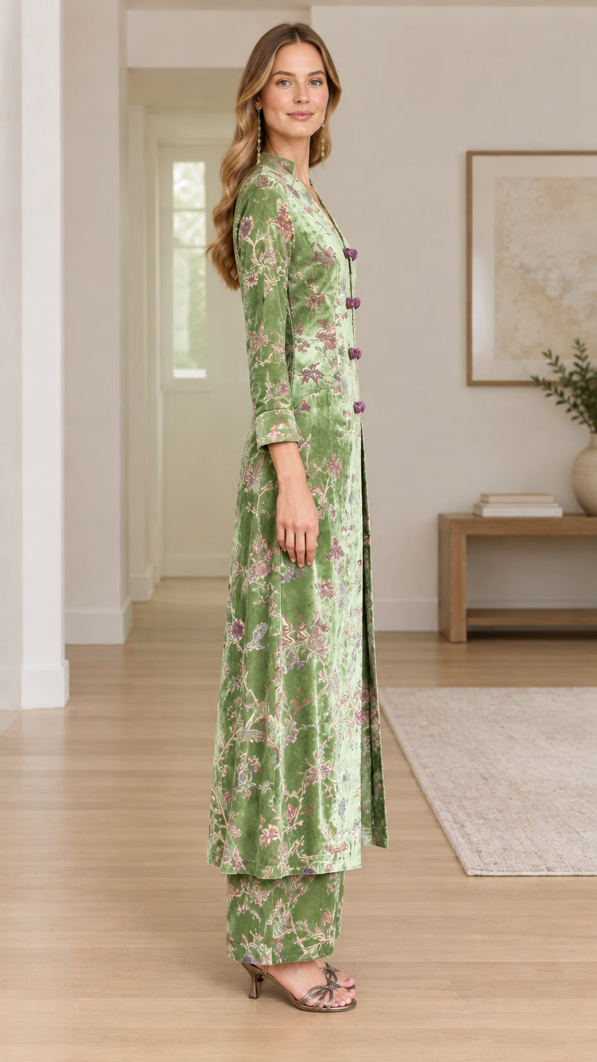 Side angle view of model in Sage Green floral velvet two-piece co-ord set