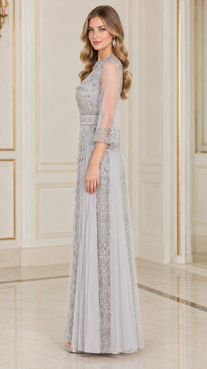 Side profile view of silver grey beaded A-line formal maxi dress with sheer sleeves