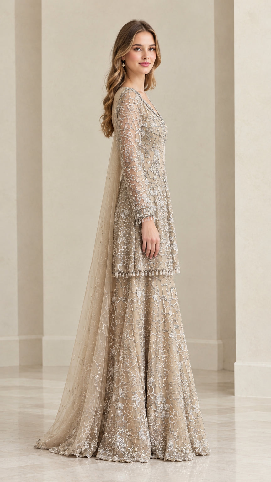 Side profile view of champagne beaded peplum tunic and wide-leg sharara pants
