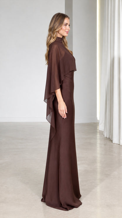 Side profile of model wearing Chocolate Brown floor-length capelet gown