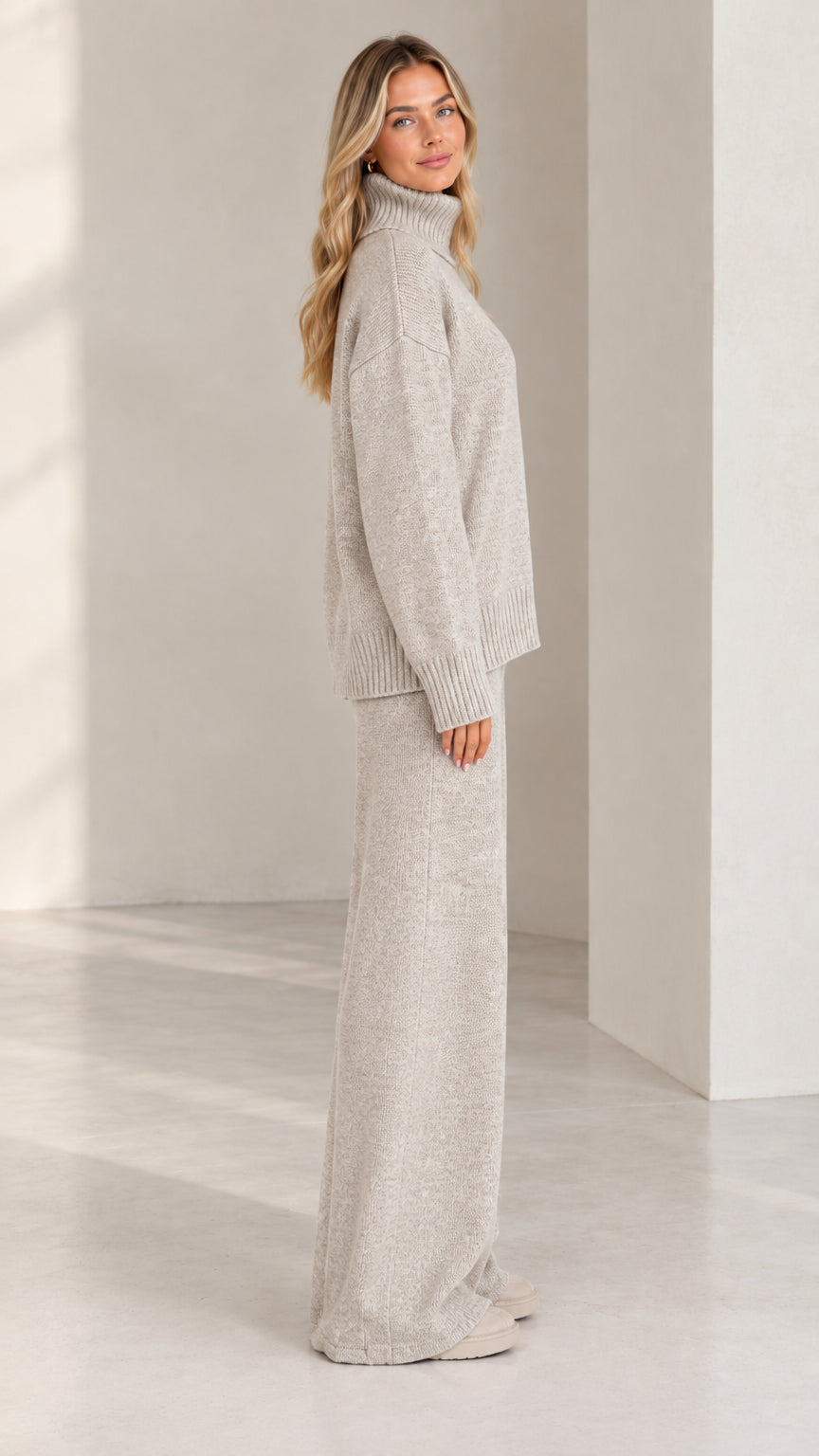 Side profile view of women wearing heather grey knit lounge set