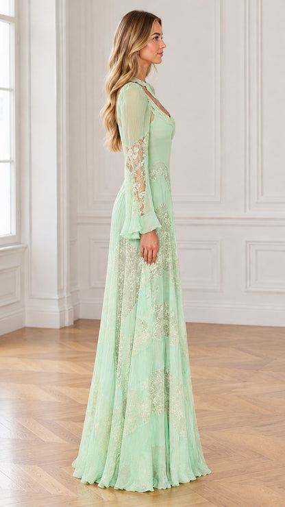 Side profile view of mint green long sleeve lace inset maxi gown