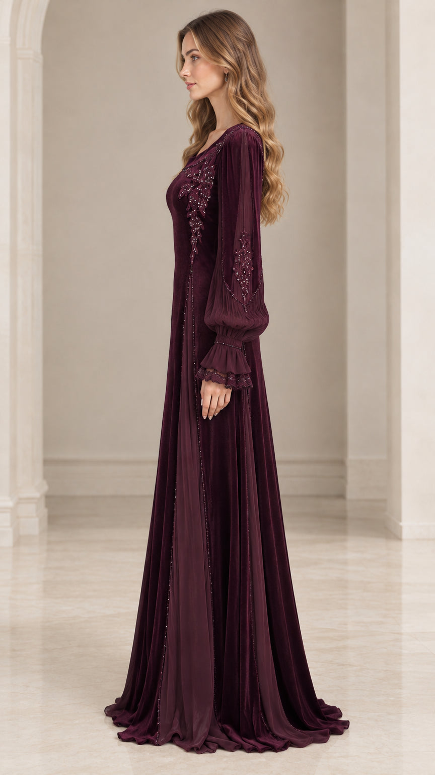 Side profile of burgundy beaded velvet floor-length formal dress