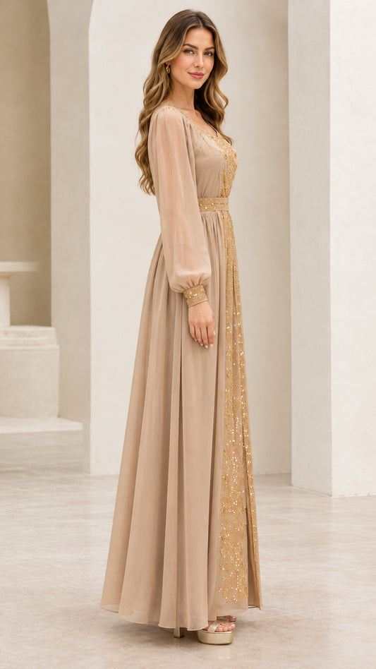 Side profile view of woman wearing Champagne flowing long sleeve formal maxi gown