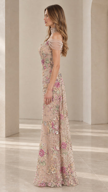 Side profile of model wearing Champagne floral embroidered floor-length gown