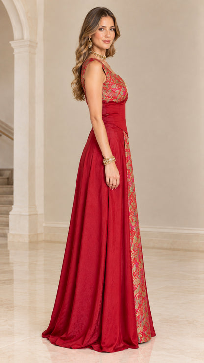 Side profile of model wearing red floral jacquard A-line evening gown