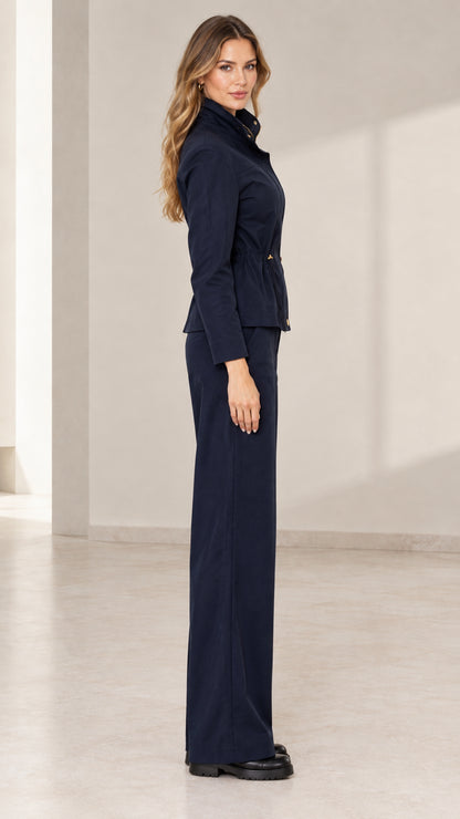 Side profile view of model in Navy Blue coordinating two-piece pant set