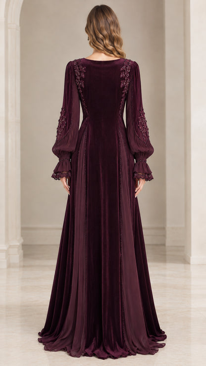 Back view of burgundy velvet maxi gown with beaded shoulder embroidery