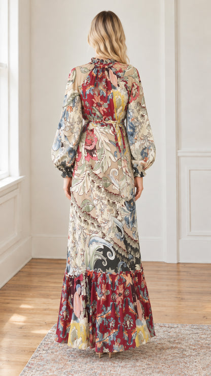 Back view of woman modeling ruffled high-neck long-sleeve maxi dress