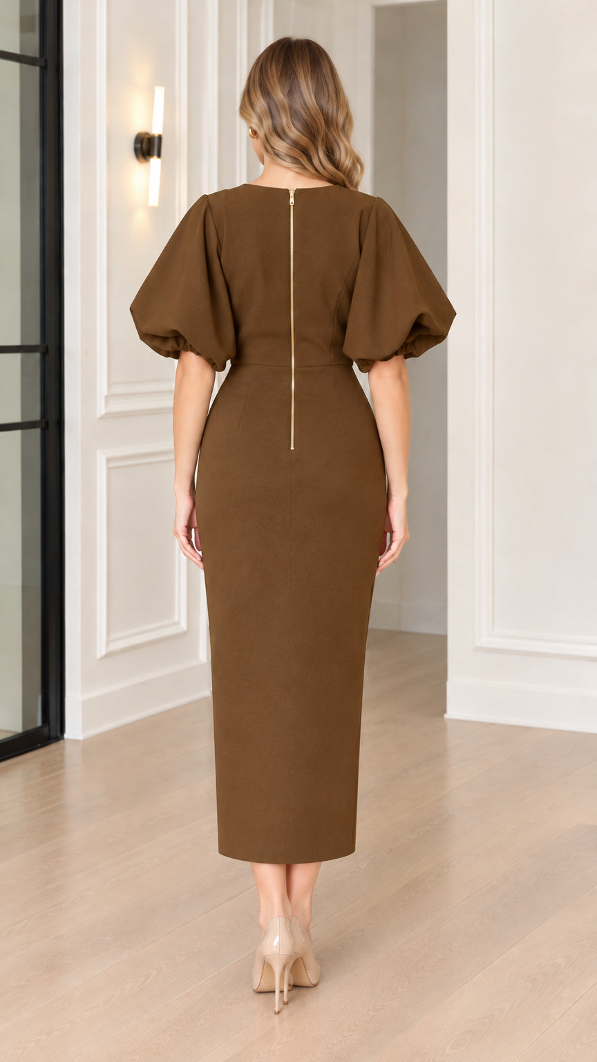Back full view of brown midi sheath dress showing back zipper and hem slit