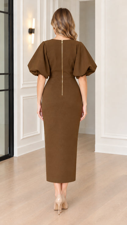 Back full view of brown midi sheath dress showing back zipper and hem slit